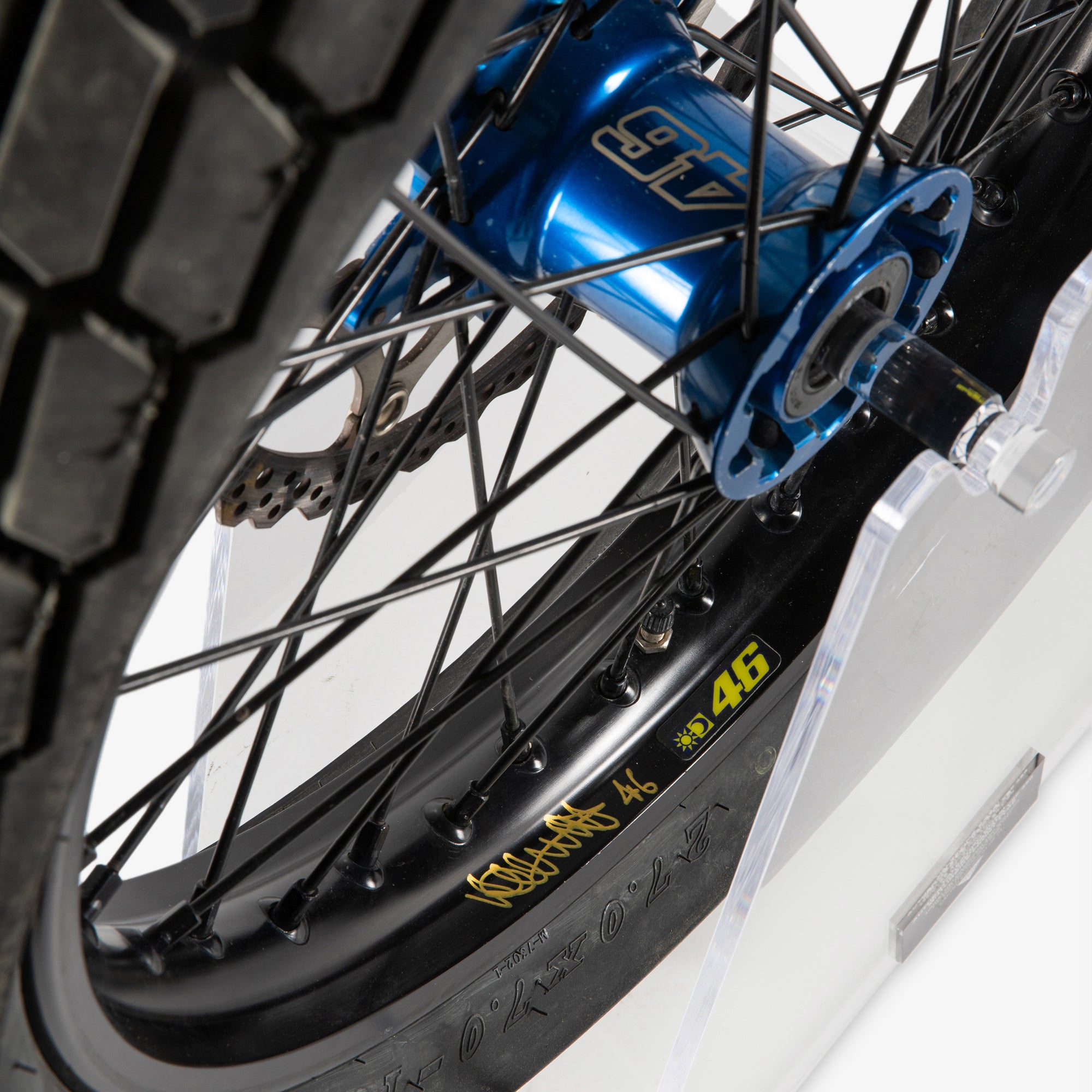 LOT 106 – Valentino Rossi 2025 10th Anniversary 100km Dei Campioni Signed & Used Front Tyre & Wheel