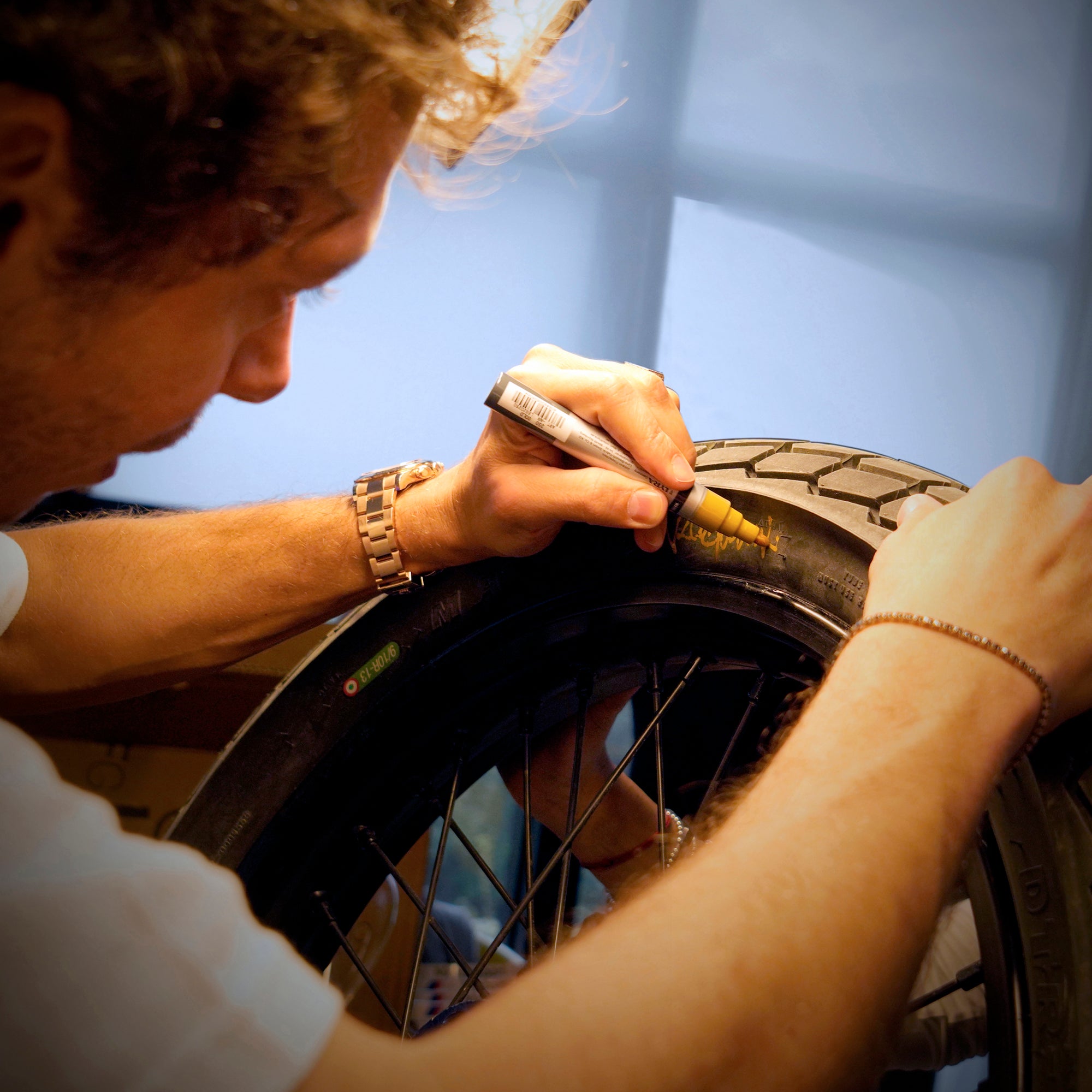 LOT 106 – Valentino Rossi 2025 10th Anniversary 100km Dei Campioni Signed & Used Front Tyre & Wheel