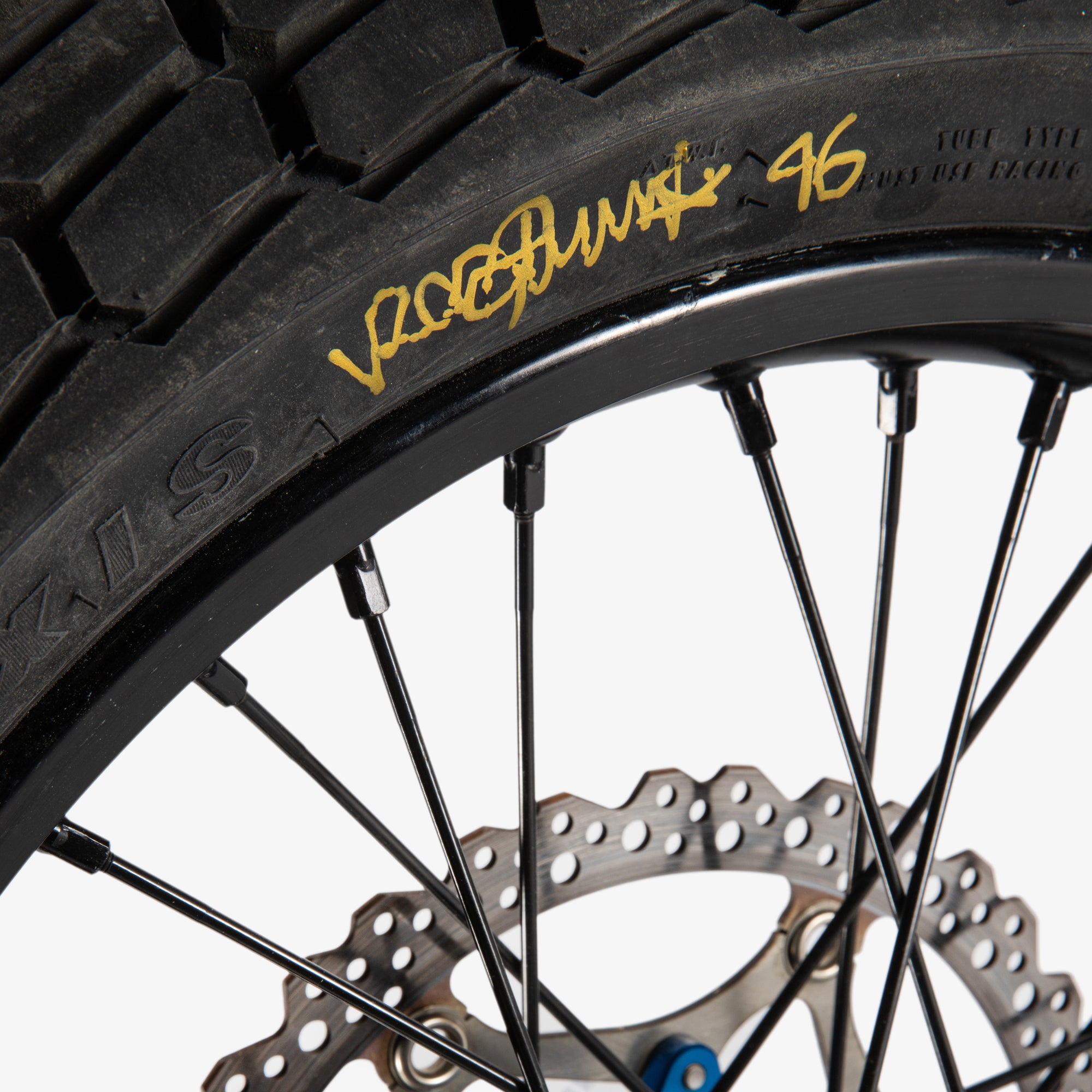 LOT 106 – Valentino Rossi 2025 10th Anniversary 100km Dei Campioni Signed & Used Front Tyre & Wheel